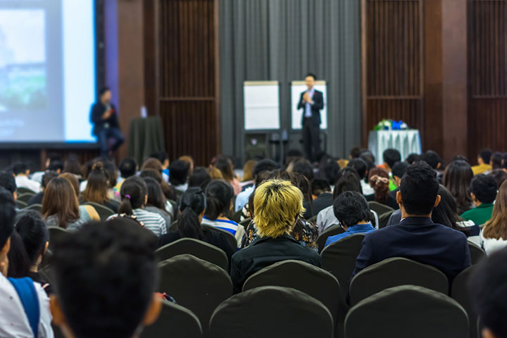 What preparations should be made for attending academic conferences
